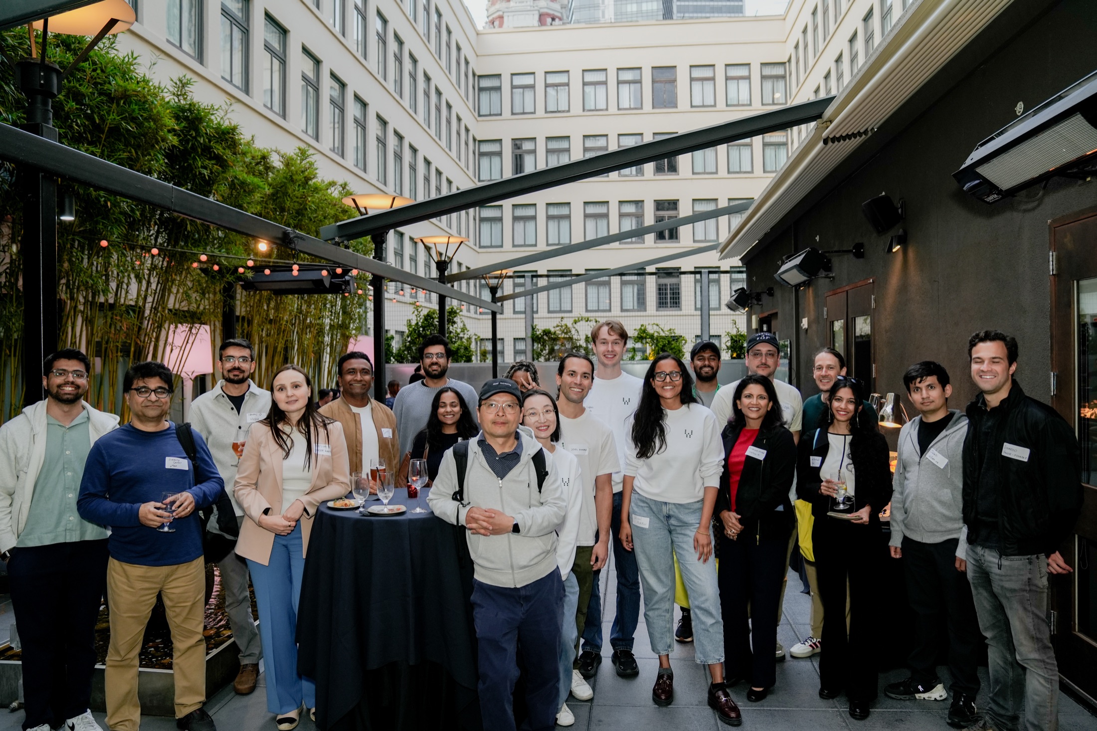 The Wajo team gathered around a table on a rooftop patio in San Francisco